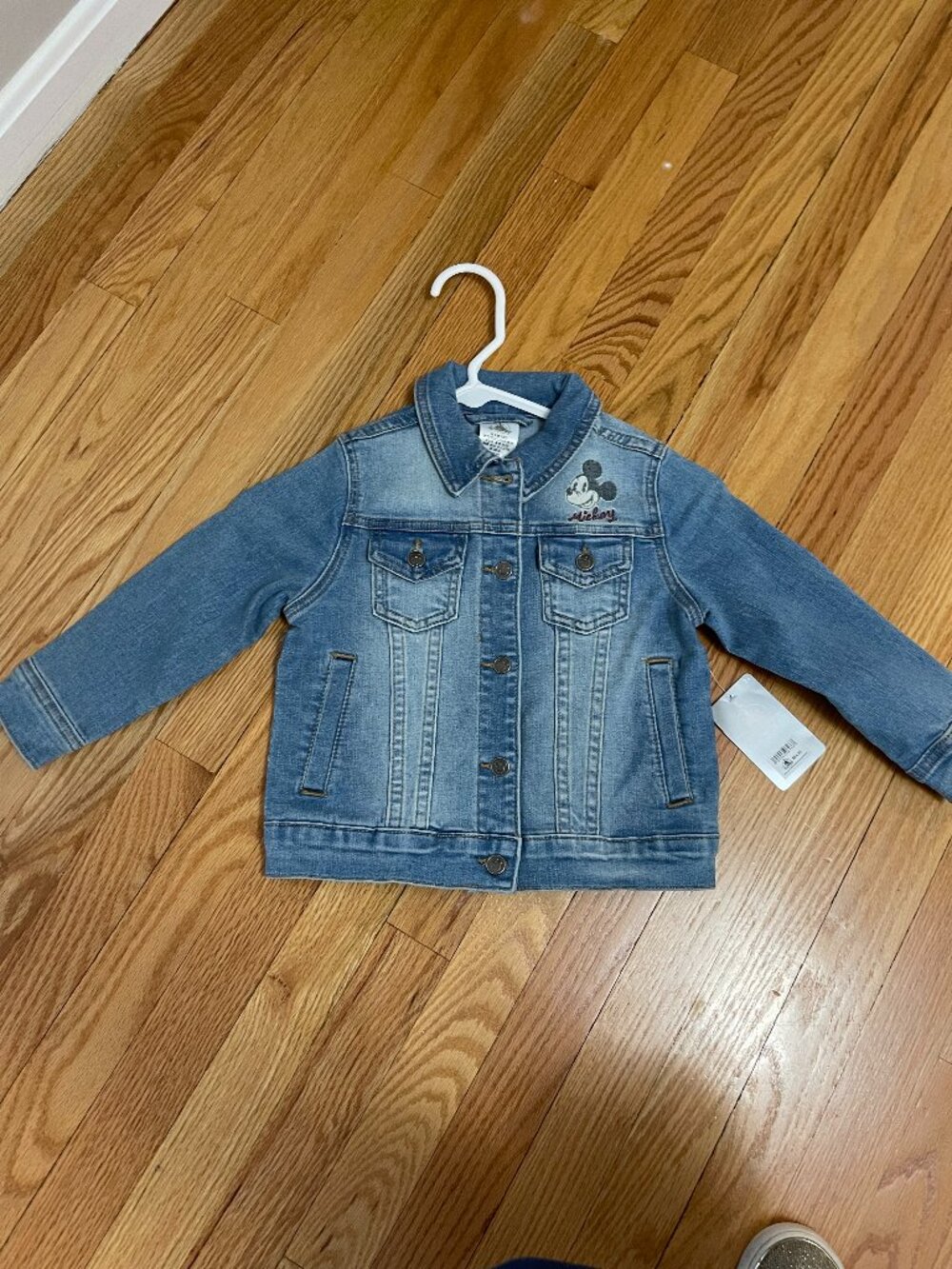 Brand new Mickey Mouse jean jacket with tags on size 2